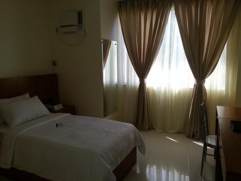 Parkway Hotel Surigao Habitación foto